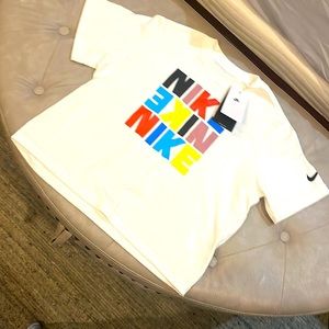 Nike NWT Sm/ Kids M Crop T Shirt , sleeve logo- related fit, goes with tons